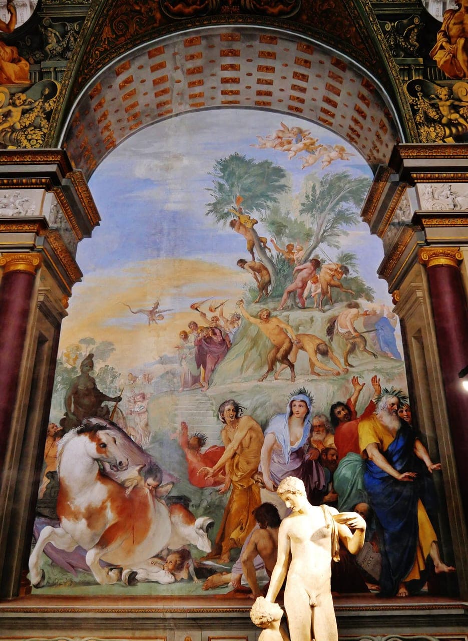 Richly frescoed interior of the Museo degli Argenti (Tesoro dei Granduchi), Pitti Palace, with a classical statue