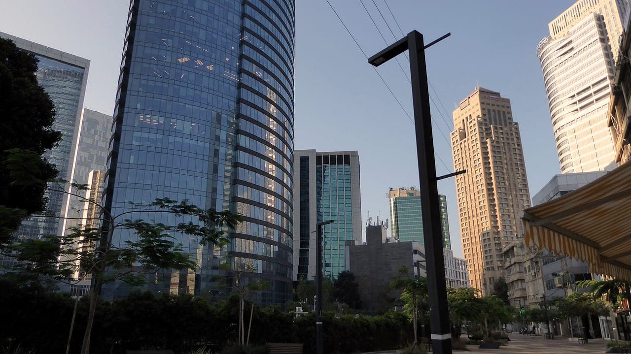 Ramat Gan diamond-exchange district — ground-level plaza view of the glass office towers