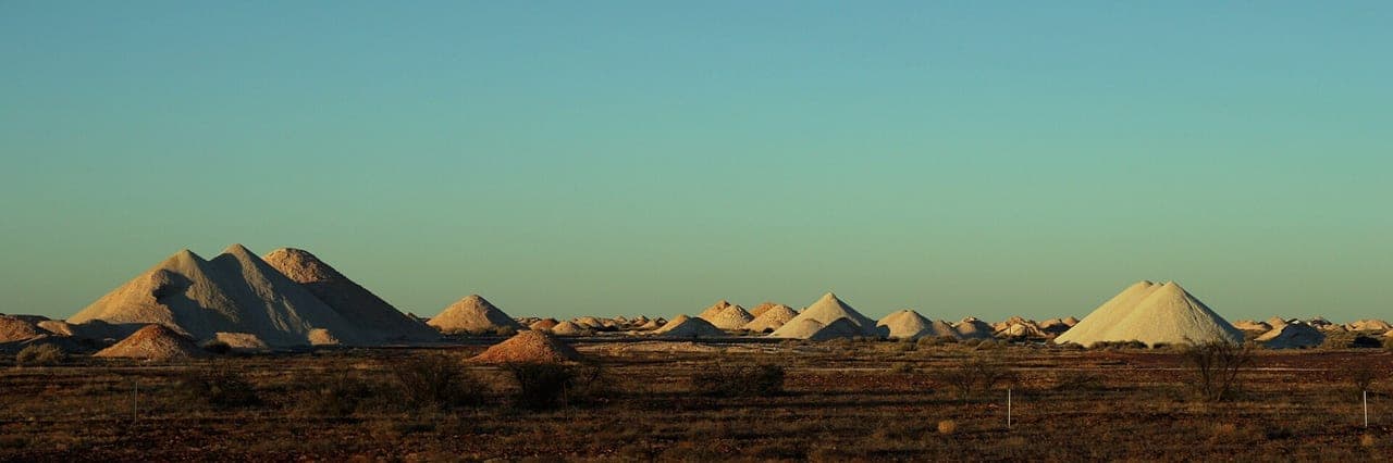 Open opal mine shafts and diggings on the fields at Coober Pedy, South Australia